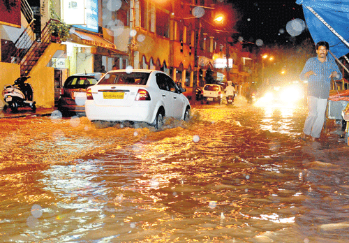 Messy : A flooded road in Ulsoor.