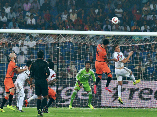 Young NorthEast United FC goalkeeper T P Rehenesh made three spectacular saves to deny Delhi Dynamos a win as the the two sides settled for a goal-less stalemate after an entertaining Hero Indian Super League match here today. PTI photo