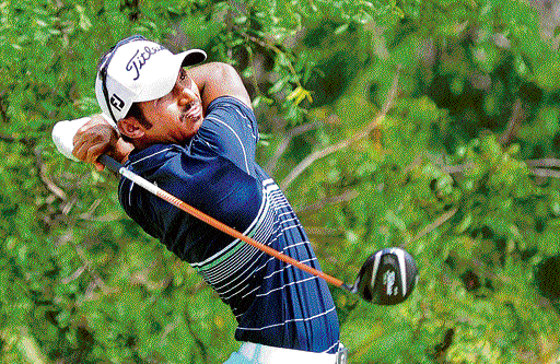 ON FIRE: S Chikkarangappa in action during the first round of the India Masters. DH PHOTO/ SRIKANTA SHARMA R