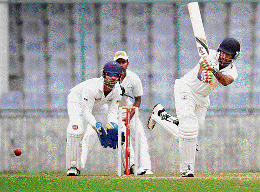 Patient knock: Central Zone's Faiz Fazal sends one to the fence during his 49 against South Zone on Thursday.