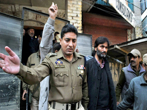 Police arrested Chief of Jammu and Kashmir Liberation Front Mohammad Yasin Malik for launching election boycott campaign ahead of the State Assembly elections, in Srinagar. PTI photo