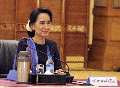 Myanmar opposition leader Aung San Suu Kyi smiles during a meeting at the presidential palace at Naypyitaw. Reuters photo