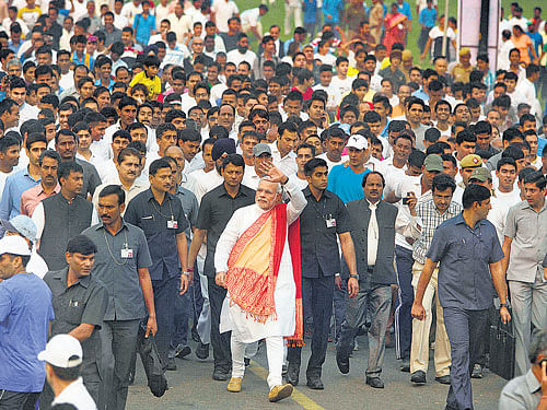 Prime Minister Narendra Modi participates in a run for unity to mark the birth anniversary of freedom fighter and first Home Minister of Independent India Sardar Vallabhbhai Patel in New Delhi on Friday. AP