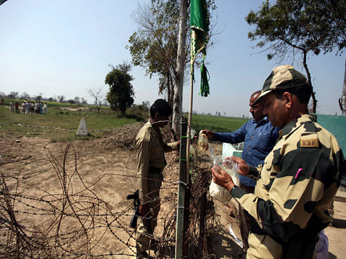 Border Security Force (BSF) troopers were put on high alert along the India-Pakistan international border Sunday evening after a massive blast left over 45 people dead and over 70 others injured at Wagah in neighbouring Pakistan. PTI file mphoto