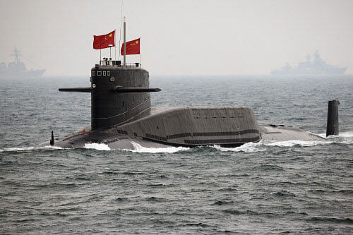 Sri Lanka has allowed a Chinese submarine and a warship to dock at its port in the capital Colombo, officials said on Sunday, despite concerns raised by India about China's warming relations with the Indian Ocean island nation.  File photo AP