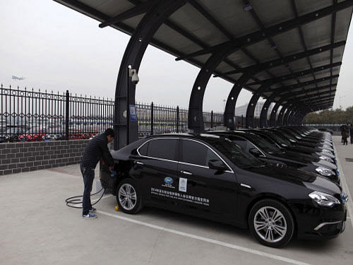 A new inexpensive battery that can triple the driving range of electric cars while significantly lowering their cost could reach the market in just over a year, scientists say. Reuters photo. For representation purpose