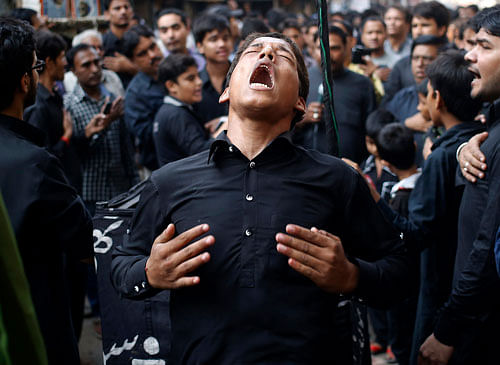 Muharram processions in Delhi passed off without any untoward incidents on Tuesday amidst heavy deployment of police forces in communally sensitive locations in Bawana, Trilokpuri and Karbala among others. Reuters photo