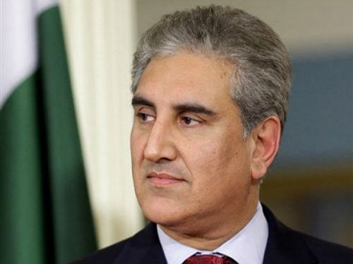 Former Pakistan Foreign Minister Shah Mahmood Qureshi today inadvertently stepped into Indian territory while visiting the Wagah border.AP File Photo