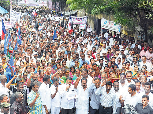 Fishermen gather at Chennai collectorate to protest against the death penaltyawarded tofive colleagues by a Sri Lankan court in a drug trafficking case. DH PHOTO