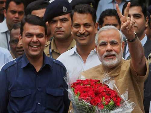 A man who posed as a public servant and gained unauthorised entry into the swearing-in ceremony of Maharashtra Chief Minister Devendra Fadnavis where he shared dais with Prime Minister Narendra Modi, has been arrested. PTI file photo