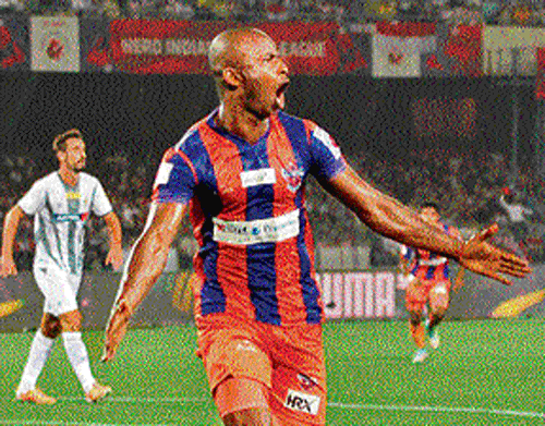 jubilant: Pune's Dudu Omagbemi is ecstatic after scoring against Atletico de Kolkata in their ISL match on Friday.