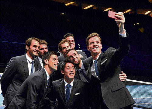 caught in the craZe: Tomas Berdych (right) takes a selfie with fellow ATP World Tour Finals' competitors on Friday. reuters
