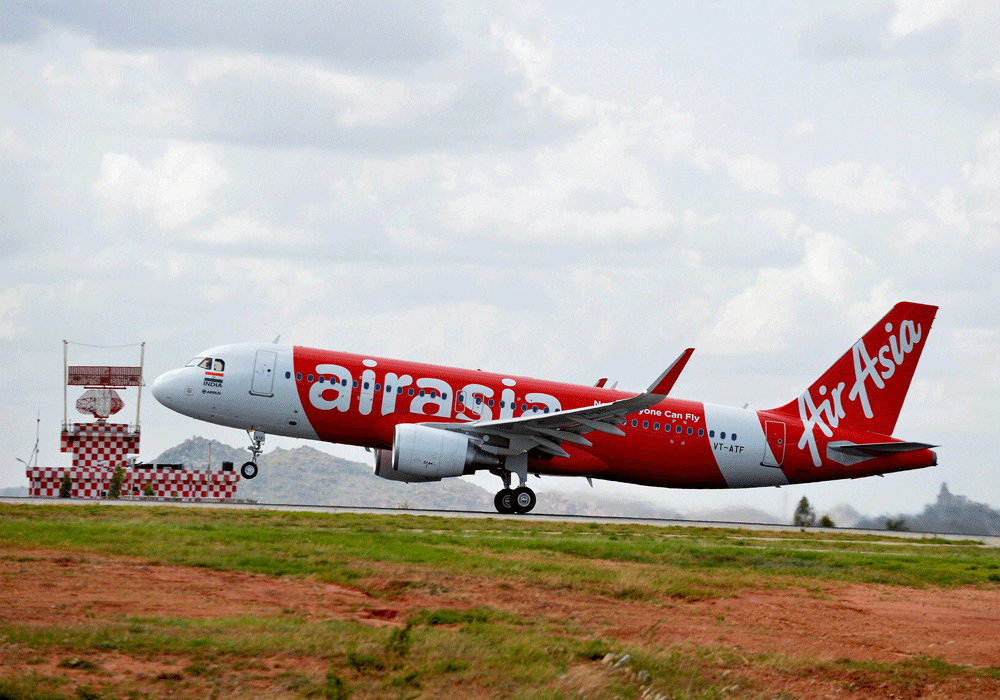 AirAsia India today joined the domestic fare war launching a week-long sale offer for its entire network with one-way tickets with prices as low as Rs 699 including taxes. PTI file photo