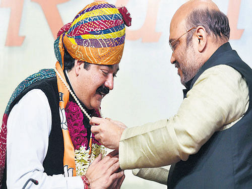 Senior Congress leader Karan Singh's son and National Conference leader Ajatshatru Singh on Sunday joined BJP. PTi Photo