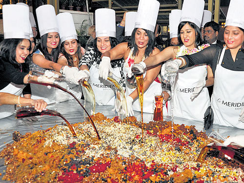 A&#8200;grand cake-mixing ceremony was held at Le Meridian recently and a number of guests turned up for it. The atmosphere was cheerful as the guests wore the chef's hat and apron and helped in the mixing.