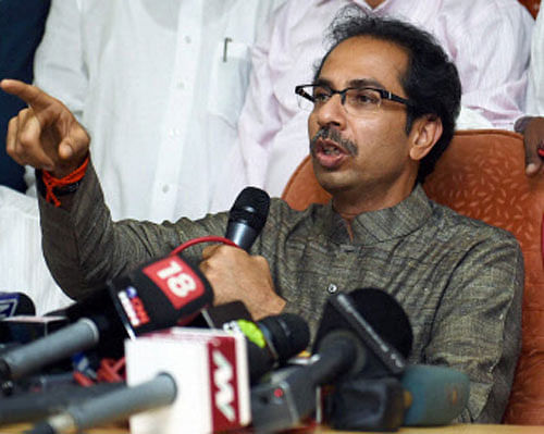 After Uddhav Thackeray hit out at All-India Majlis-e-Ittehadul Muslimeen, his party Shiv Sena today stepped up attack on the Hyderabad-based outfit,accusing it of poisoning the minds of minority community and demanded that Maharashtra government take strict action against it. PTI photo