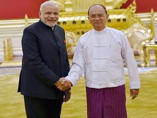 Prime Minister Narendra Modi with Myanmar's President U Thein Sein during a meeting at Presidential Palace in Myanmar on Tuesday. PTI