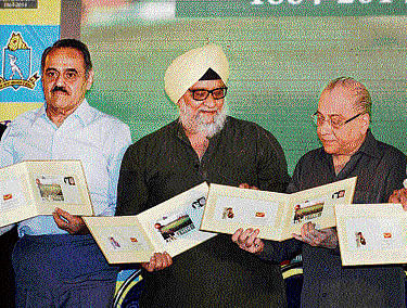 From left:&#8200;B S Chandrasekhar, Bishan Singh Bedi, CAB President Jagmohan Dalmiya after releasing a stamp marking the 150th anniversary of the Eden Gardens on Tuesday. PTI Photo