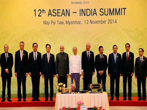 Prime Minister Narendra Modi with ASEAN leaders at a group photo session during the 12th India-ASEAN Summit in Nay Pyi Taw, Myanmar. Asserting that India and ASEAN have 'no irritants' in their ties, Prime Minister Narendra Modi today invited the 10-nation bloc to be part of his country's 'new' economic journey even as his strong 'Make in India' pitch got the support of the grouping. PTI photo