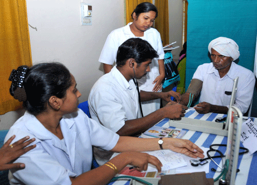 Visitors getting diagnoised at the inauguration of Diabetic and Blood Pressure Check Camp at ESI Hospital in BAngalore on Tuesday. DH file photo
