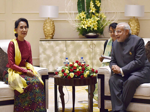 Prime Minister Narendra Modi with Chairperson and General Secretary of the National League for Democracy, Aung San Suu Kyi during a meeting at Nay Pyi Taw in Myanmar. PTI photo