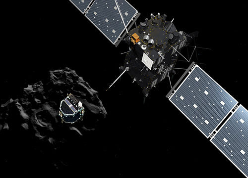 The image released by the European Space Agency ESA on Wednesday, Nov. 12, 2014 shows an artist rendering by the ATG medialab depicting lander Philae separating from Rosetta mother spaceship and descending to the surface of comet 67P/Churyumov-Gerasimenko. European Space Agency said Wednesday that the landing craft separated from Rosetta probe for descent to comet 67P. AP Photo
