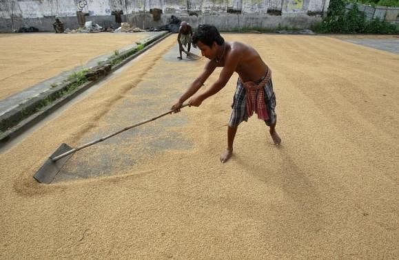 Paving the way for implementation of trade facilitation pacts at WTO, India and US have resolved an impasse over food security related issues while safeguarding interest of Indian farmers.Reuters photo