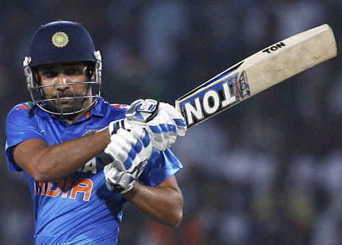 Rohit Sharma today created history by hitting the highest individual ODI score with an incredible knock of 264 to power India to a mammoth 404 for five in fourth cricket one-dayer against Sri Lanka here today. PTI File photo