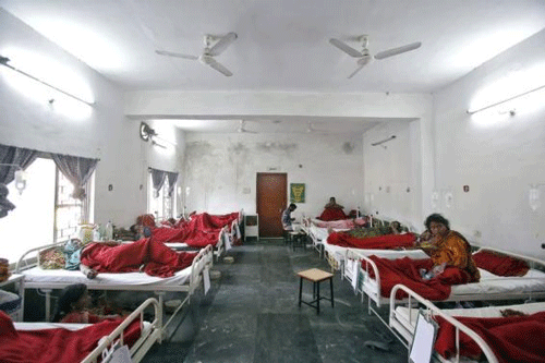 Women, who underwent a sterilization surgery at a government mass sterilisation "camp", lie in hospital beds for treatment at Chhattisgarh Institute of Medical Sciences (CIMS) hospital in Bilaspur. Reuters image