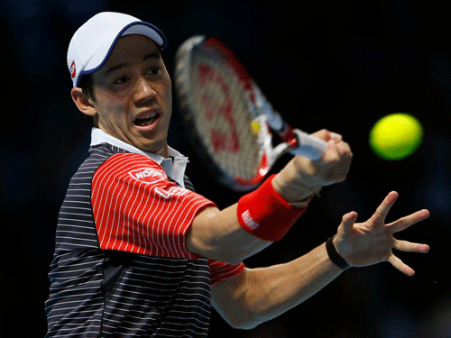 Japan's Kei Nishikori beat David Ferrer, a replacement for the injured Milos Raonic,  to keep alive his chances of qualifying for the semifinals. Reuters Photo