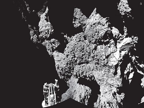 10-year odyssey: The first photo sent by the Philae on Thursday is pictured above with one of the lander's feet  visible in the foreground. AP/ESA Photo