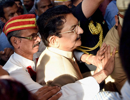 Congress MLAs obstruct Maharashtra Governor C Vidyasagar Rao from entering Vidhan Bhavan for the three-day special session in protest of the trust vote in Mumbai on Wednesday. PTI Photo