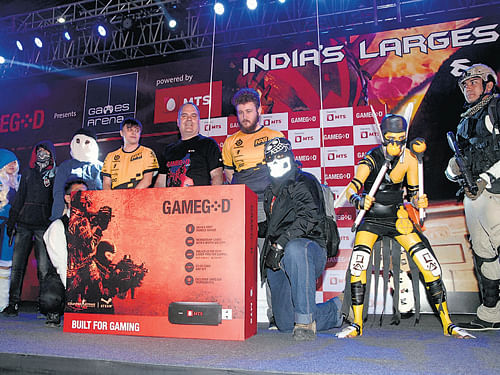 World-renowned gamers at the The GameGod Arena, Bangalore International Exhibition  Centre in the City on Friday. DH Photo