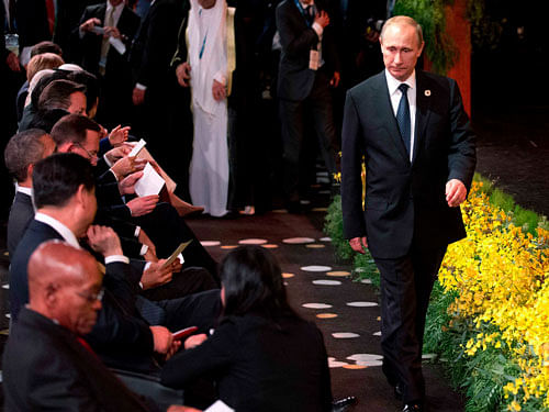 Russia's President Vladimir Putin arrives at the 'Welcome to Country' ceremony at the G20 summit in Brisbane. Reuters image