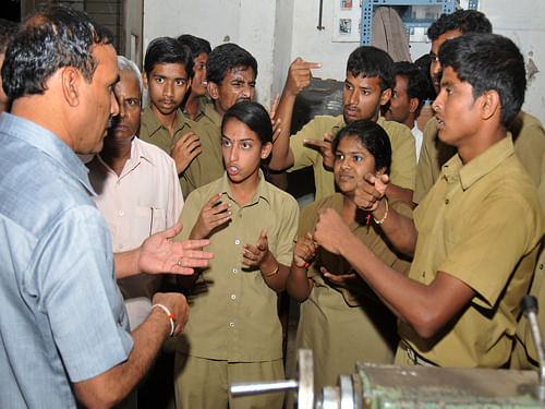 Disable Commissioner K V Rajanna interact with the deaf and dump students during his visit the technical training institute for the deaf and dump at Hains road in Bangalore. DH file photo