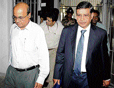 Union steel secretary Rakesh Singh(right) and Odisha chief secretary G C Pati coming out after a meeting in Bhubaneswar on Monday to discuss the progress of the  ongoing steel projects in Odisha, including Posco. DH Photo