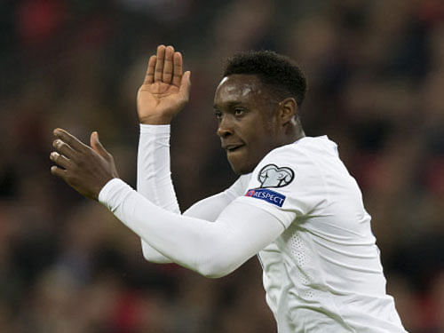 England's Danny Welbeck applauds his teammates during his team's Euro 2016 Group E qualifying soccer match against Slovenia at Wembley Stadium, London. AP file photo