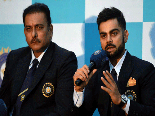 Director cricket Ravi Shastri and skipper Virat Kohli at a pre-departure conference before the team leaves for the Australia tour, in Mumbai. Cricket Australia's officials were all geared up this morning to receive the Indian cricket team for the much-anticipated Test and limited-overs series here -- the only problem was that they got the timing of the visitors' arrival wrong. PTI photo