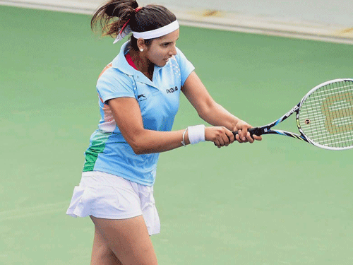 Indian tennis ace Sania Mirza today said she wants to reach No. 1 position in the world rankings before bidding adieu to the game. PTI file photo