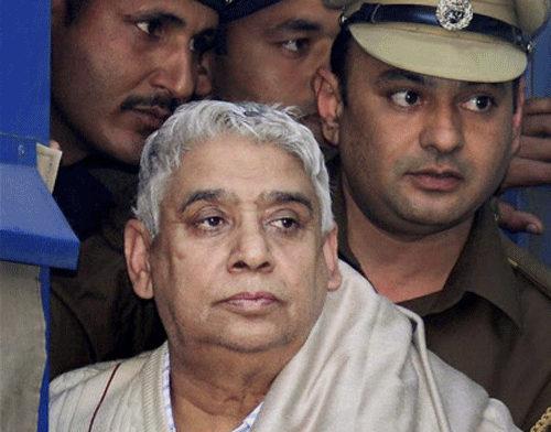 Cash, weapons, bullet-proof jackets and commando dresses were today found even as lockers were opened at arrested 'godman' Rampal's Satlok Ashram, where he was taken by the police for the first time since his arrest on November 19. PTI file photo