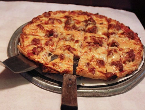 Papa John's acquires Pizza Corner