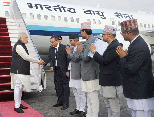 Prime Minister Narendra Modi on Tuesday made a strong pitch for the early drafting of Nepal's Constitution, saying if the country fails to do so it may get into difficulties. PTI Photo