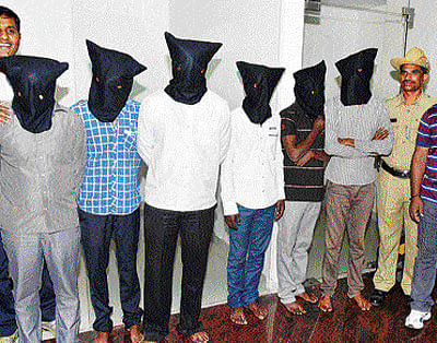 The six men who allegedly terrified five women sitting in  a car on MG Road recently. dh photo
