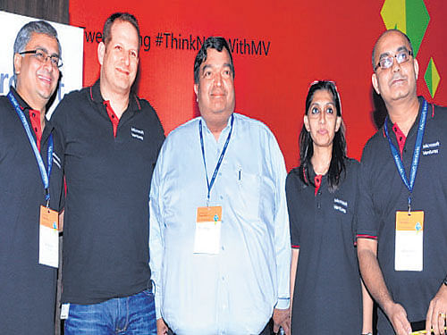 Microsoft Ventures India Director Ravi Narayan (left) with Microsoft Venture Global Accelerators head Tzahi Weisfeld (second left) and Nasscom Product Council Chairman Ravi Gururaj (centre) at the graduation function of the fifth batch of the Accelerator programme in Bengaluru on Tuesday.