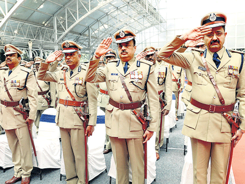 Police officers seen at a ceremony organised to present the President's medals at the Raj Bhavan on Wednesday. KPN