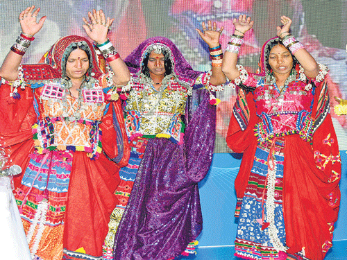 Lambani women from Sandur Kushala Kala Kendra perform at the 23rd Congress of the International Sericultural Commission in Bengaluru recently. DH PHOTO