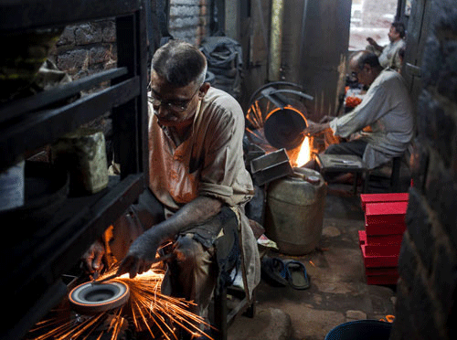 Indian economy grew at a better- than-expected rate of 5.3 per cent in July-September quarter on account of improved performance of mining, power and certain services sectors. AP photo