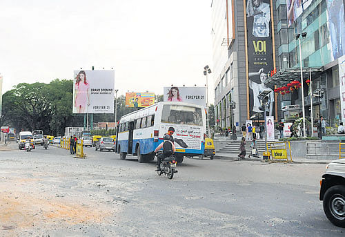 free for all: Sudden change in the direction of traffic flow, such as this one on Commissariat Road, is risky for motorists, particularly when there are not enough signboards and traffic  police personnel.  DH PHOTO