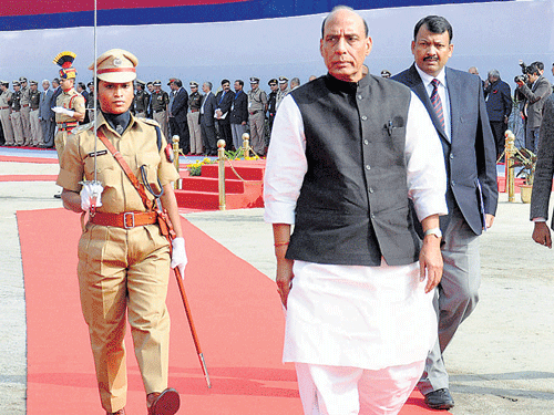 Union Home Minister Rajnath Singh is welcomed on his arrival at the DGPs' conference in Guwahati on Saturday. PTI