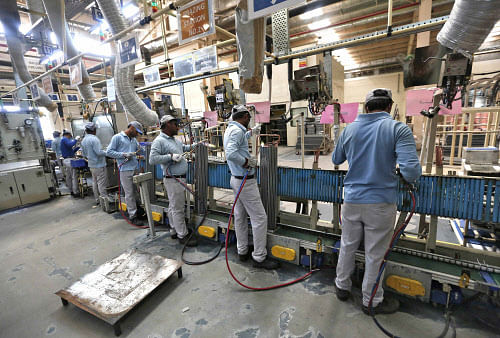 A majority of Indian employees are performing intensely and their work engagement level is highest in the world, a new study says. Reuters file photo